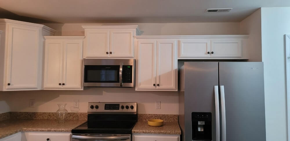 white kitchen cabinets after painting