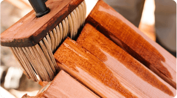 Brush staining wood